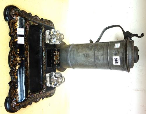 A wriggle work pewter peg tankard, possibly German (a.f), 33cm high, and a Victorian papier mache inkwell desk compendium (2).