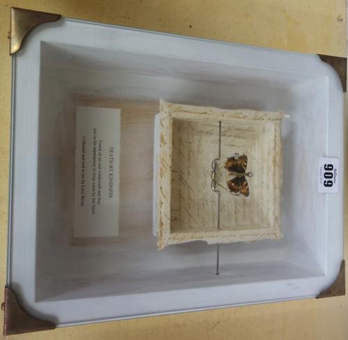 Two art installations; 'Hit and Run Victim' and 'Death by Kindness', both with automated butterfly and title in a glazed painted case, each 28cm x 22c