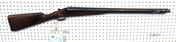 A twelve bore Spanish 'Astra' shotgun, with plain steel barrels, 70.3cm, foliate engraved backplate, and checquered walnut stock, deactivated 06/12/20