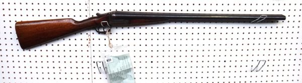 A twelve bore Belgian shotgun with plain steel barrels, 71.8cm, with plain lockplate and walnut stock, deactivated 16/06/2011, with certificate.
