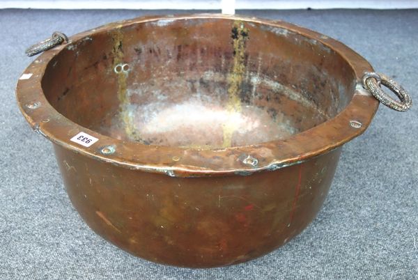 A 19th century copper cooper with loop handles, 62cm wide.
