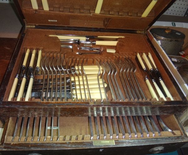 An oak cased canteen of plated flatware by Mappin & Webb.