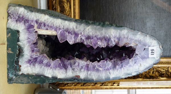 Three amethyst quartz geodes of typical naturalistic form, the largest 48cm high (3).