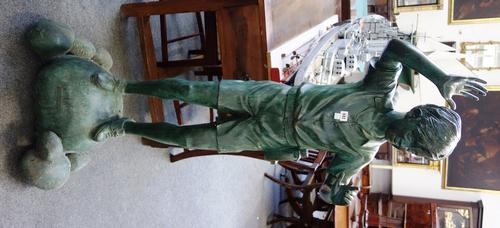 Leonardo Rossi; a group of three patinated bronze children, 20th century, each separately cast atop a stepping stone, signed 'Leonardo Rossi', compris