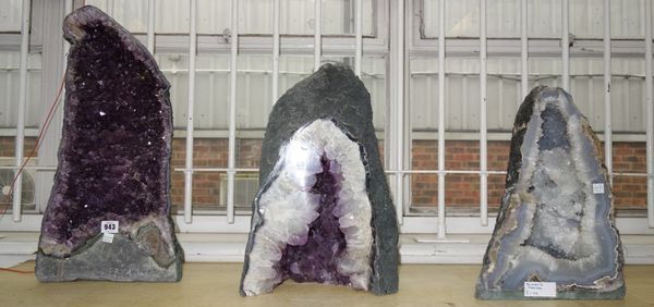 Three amethyst quartz geodes of typical naturalistic form, the largest 53cm high (3).