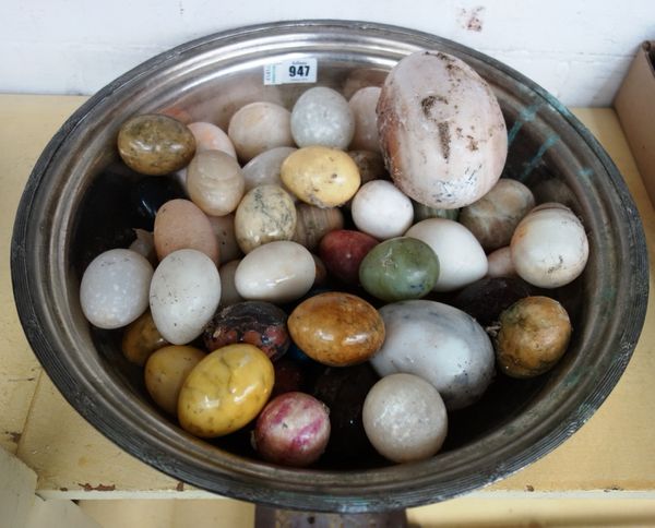 A large quantity of polished hardstone eggs, the largest 15cm, (aprox 40).