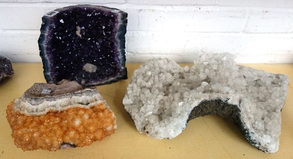 A quantity of quartz geodes of various colours, the largest 45cm wide (12).