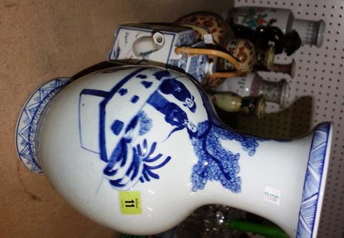 A group of Oriental ceramics and collectables including vases, candlesticks, a cast metal figure, a wooden teapot and sundry. (qty)