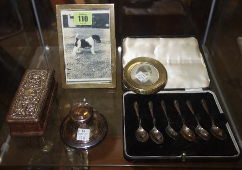 A group of silver and silver mounted wares, comprising; a rectangular photo frame, Birmingham 1923, a small circular silver frame (the hallmarks rubbe