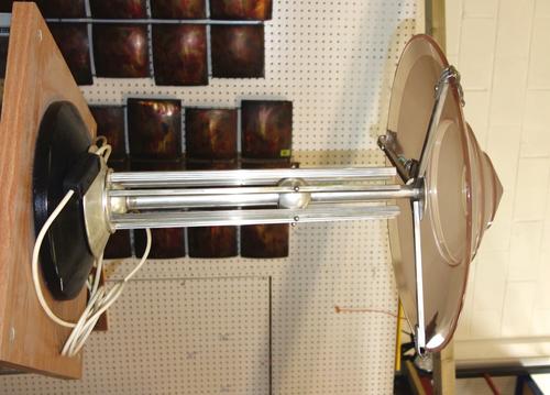 A 20th century chrome and glass Art Deco table lamp.