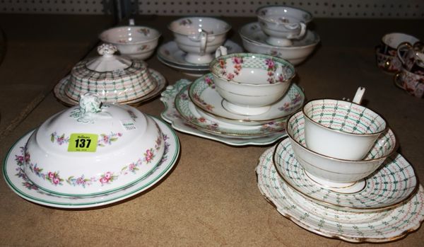 A Ridgway part tea and breakfast service, 19th century, printed and coloured with flower sprays inside a green line rim, comprising; muffin dish and c