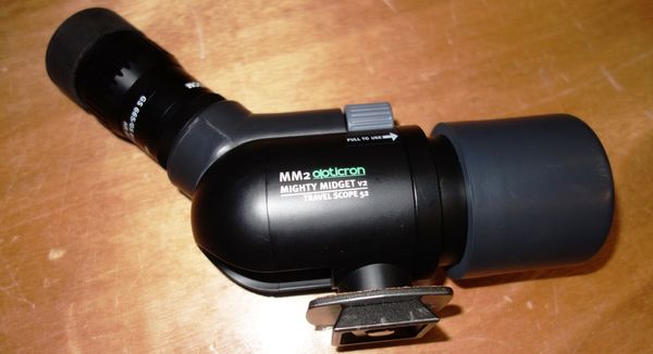 A 20th century Opticron HDF zoom travel scope, with a tripod.