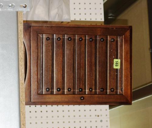 A miniature hardwood collectors chest with nine drawers and glazed door.