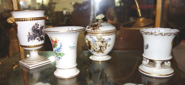 A Meissen lidded pot with floral decoration and a floral finial (a.f), together with two small Meissen vases and a Crown Derby vase. (4)