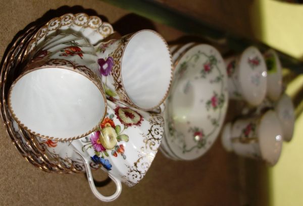 A Dresden three piece coffee set (with one extra saucer), together with a Staffordshire four piece tea set. (15)