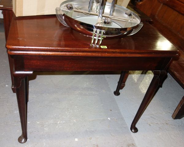 A George II mahogany card table, circa 1740, with lappet moulded club legs and pad feet, 91cm wide.