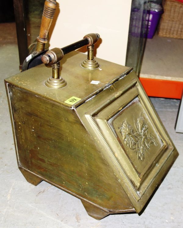 A 19th century brass slope front coal scuttle.