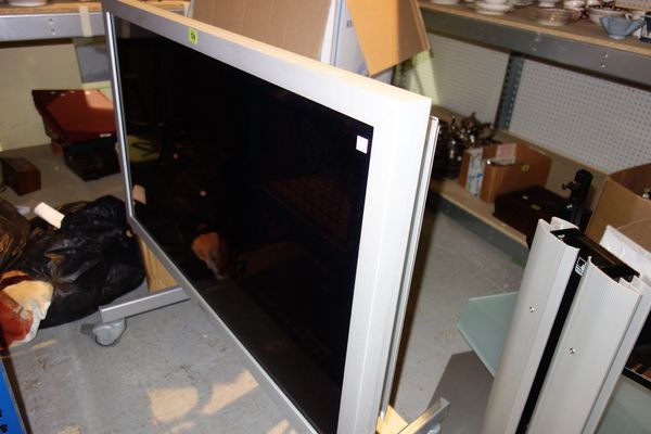 A Sanyo flat screen TV on stand.  109.1