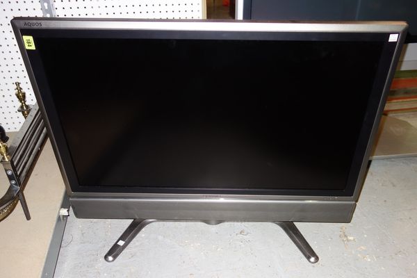 A Sharp flat screen TV.