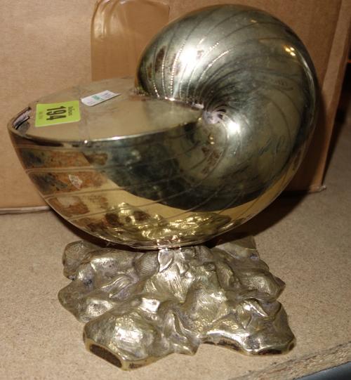 A group of silver plated wares, comprising; a Victorian spoon warmer formed as a cornucopia shell, two plated serving dishes (one with pierced liner),