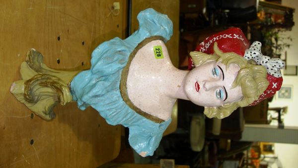 A French painted plaster bust of a lady wearing a bonnet, inscribed 'depose No 4' and signed indistinctly, 62cm high.
