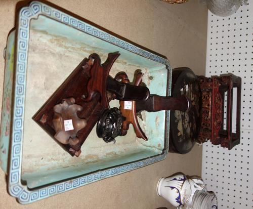A Canton enamel planter; nine lacquered circular boxes and covers, a red lacquered stand and five hardwood stands. (qty)