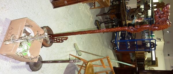 Two Chinese hardwood dragon carved stands and a 20th century three branch chandelier. (3)