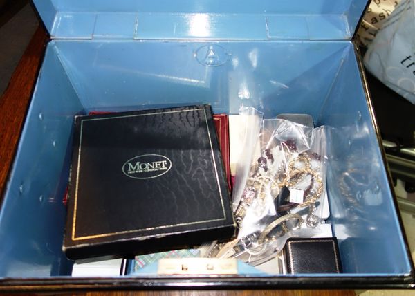 A quantity of costume jewellery and watches in a box.