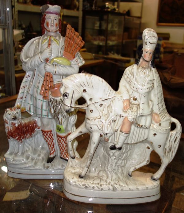A large Staffordshire pottery figure and another. (2)