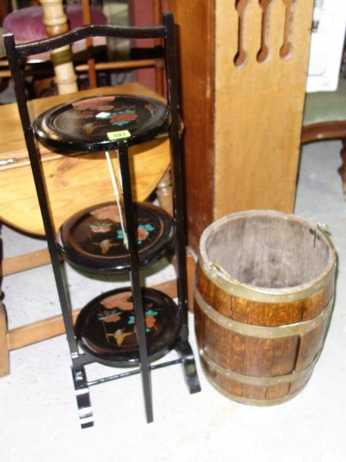 A folding three tier cake stand and a coopered oak bucket. (2)