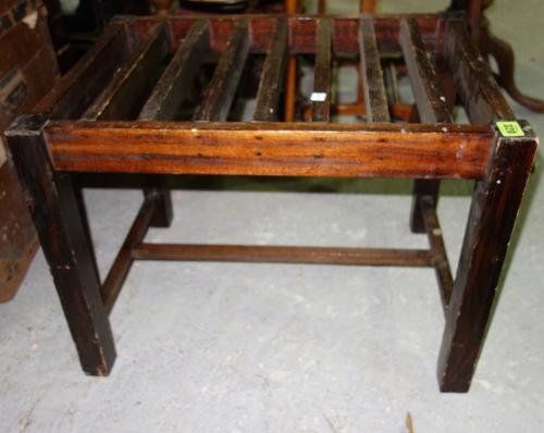 An early 20th century oak luggage stand, 60cm wide.