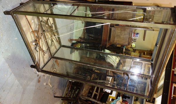 A 20th century brass and glass display cabinet.