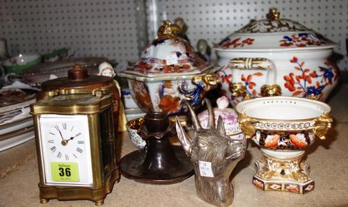 A group of ceramics and collectables including lidded Imari tureens, Lladro figure, carriage clock, white metal bottle opener shaped as a stag and sun