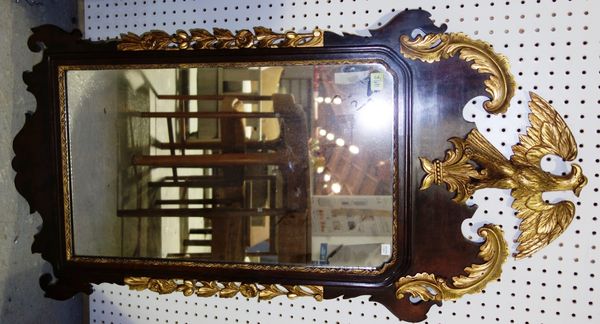 A 19th century mahogany and parcel gilt pier mirror with eagle finial, 59cm wide x 112cm high.