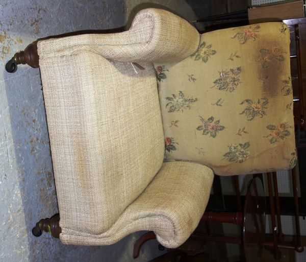 An early 20th century Howard & Sons style armchair.