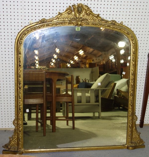 A Victorian gilt overmantel mirror with floral scrolled cresting (regilded), 116cms high.