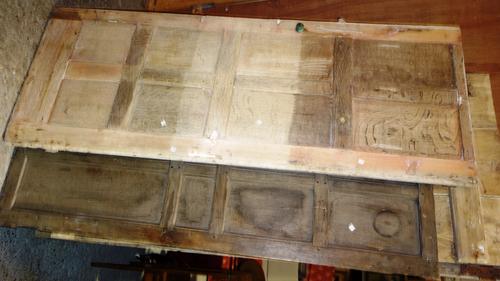 A 19th century panelled oak door and three other doors, (4).