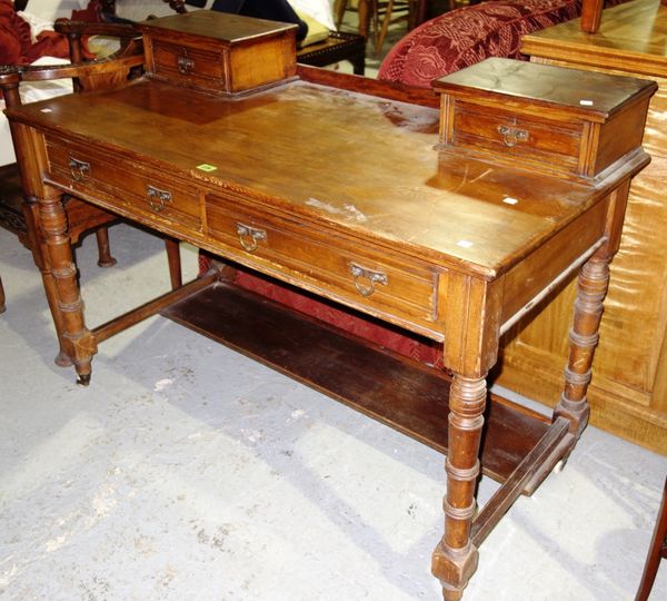 A late Victorian ash writing desk (converted from a dressing table) 121cms wide.