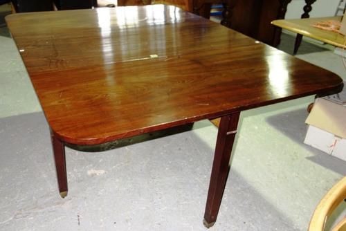 A 19th century mahogany drop flap dining table, 222 x 162 cm.