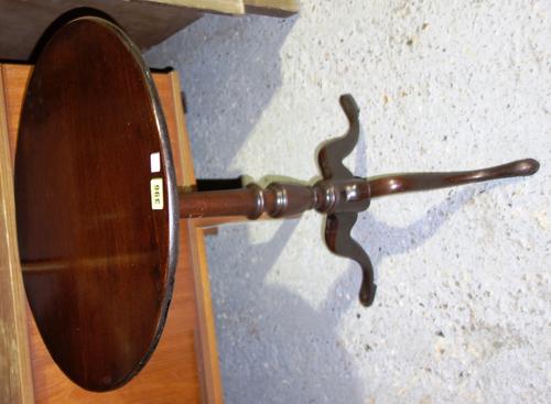 A George III mahogany snap top tripod table.