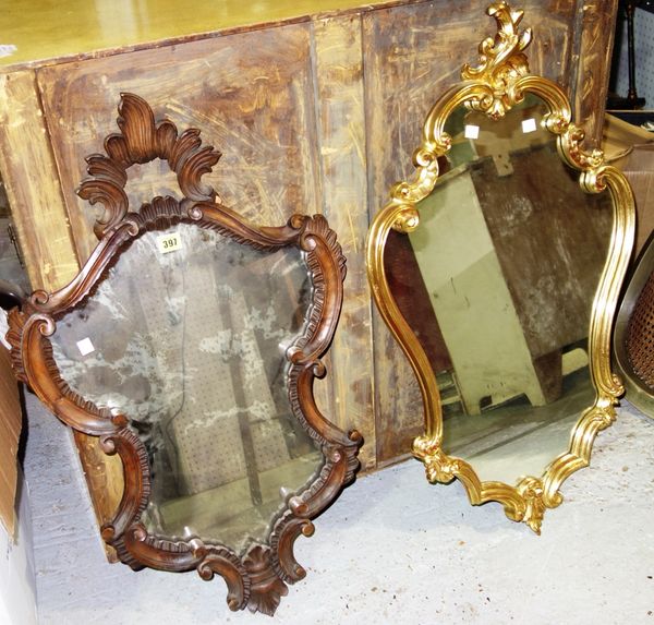 A stained beech carved wall mirror and a gilt mirror, (2).