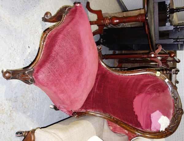 A Victorian walnut framed nursing chair.