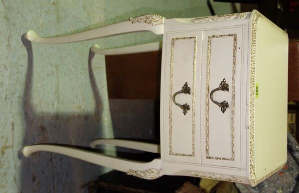 A white painted two drawer bedside cabinet.