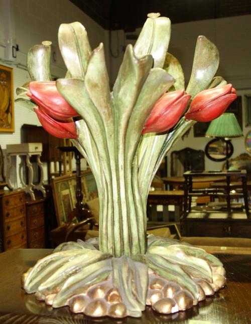 A 20th century resin and glass coffee table, the base formed as a plant.