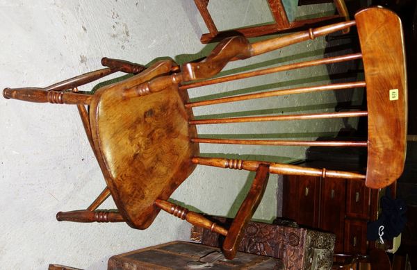 An elm seated stick back scullery armchair.