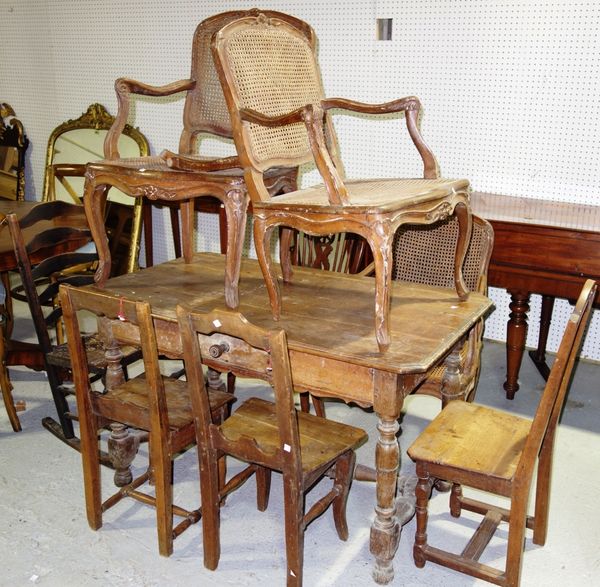 Three 18th century French fruitwood chairs, three early 19th century French beech fauteuils, an ash ladder back rocking chair and a modern Windsor cha