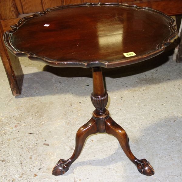 A George III style mahogany pie-crust occasional table on a tripod base, 60cm wide.