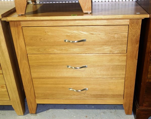 A 20th century oak three drawer chest, 84cm wide.