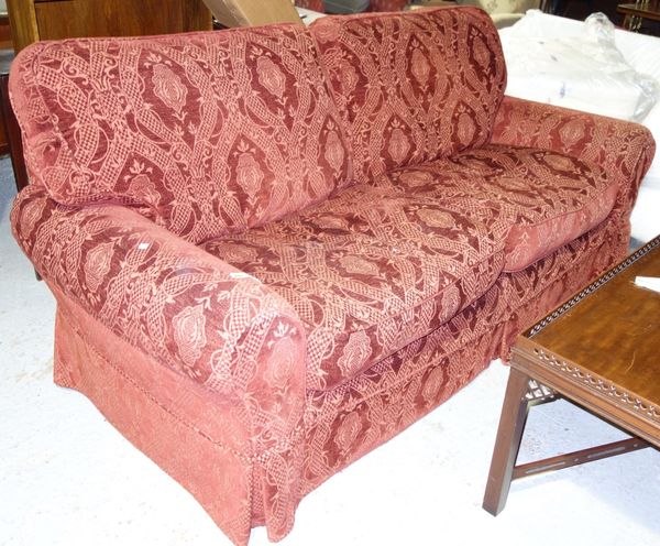 A burgundy upholstered Laura Ashley two seat sofa, 210cm wide.