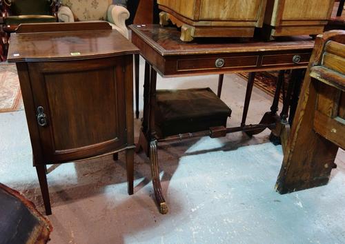 A Regency style rectangular mahogany table and a bowfront pot cupboard, (2).